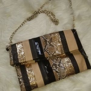 Animal/snakeskin fold clutch